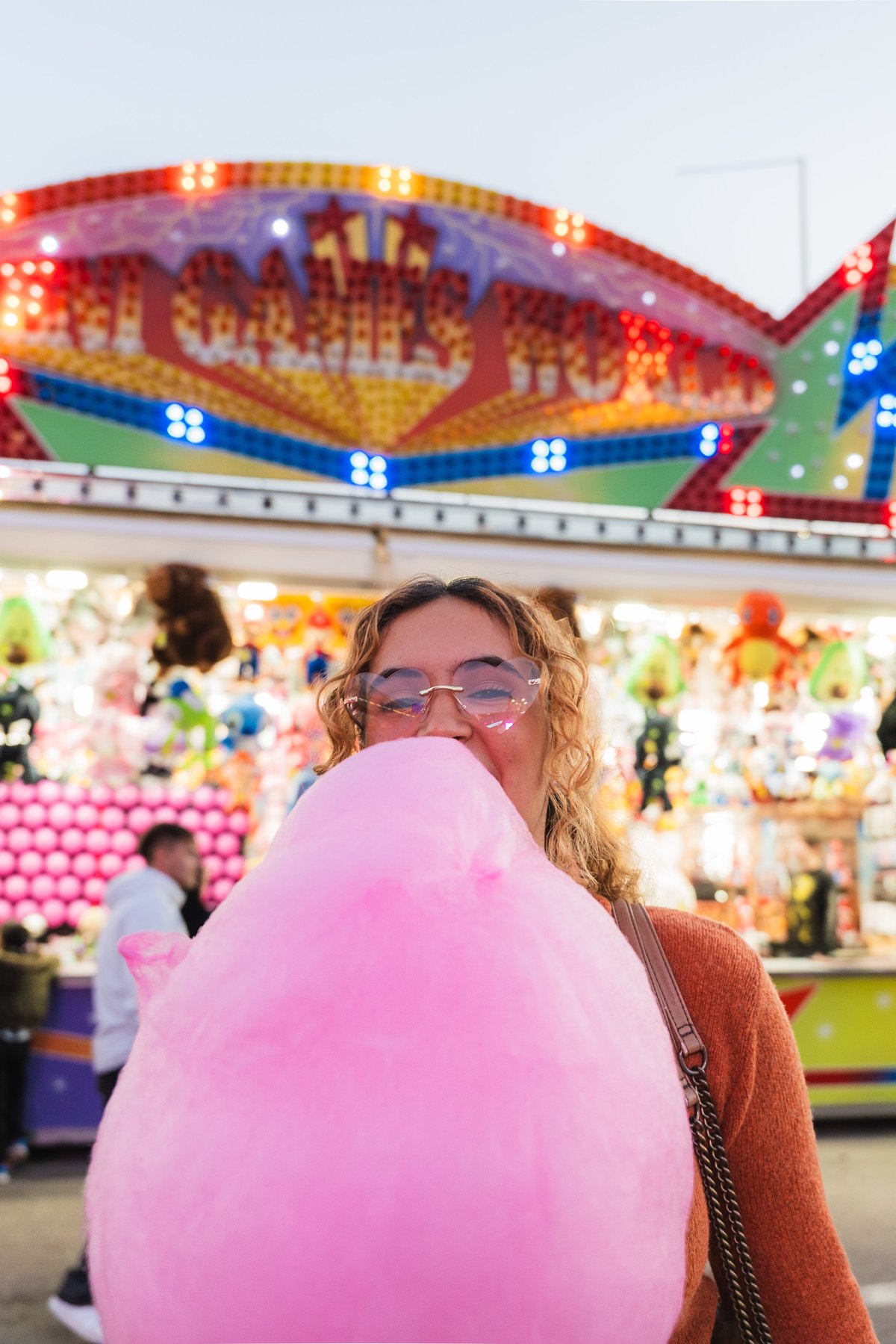 Live cotton candy station rental serving fresh spun cotton candy at a party